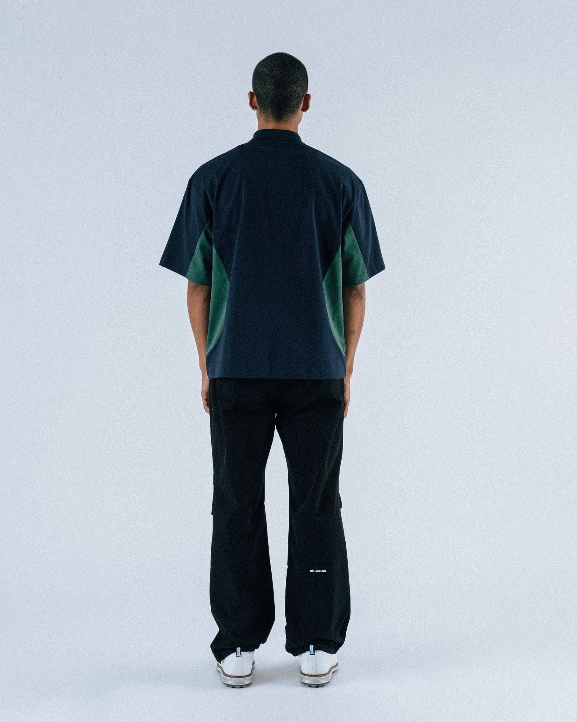 Assistant Jersey Zip Polo Shirt in navy - front view