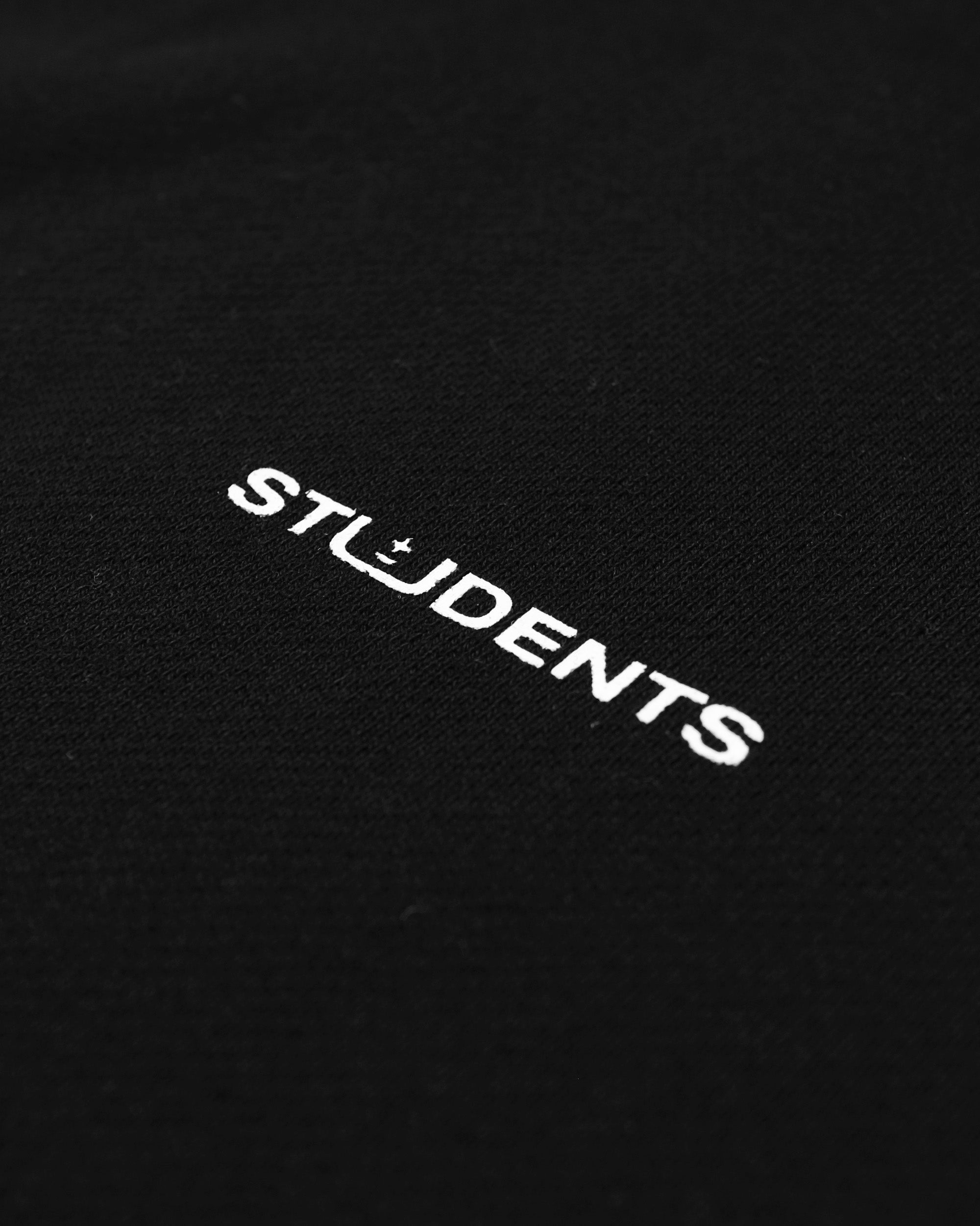 Black fabric with white 'STUDENTS' text embroidery