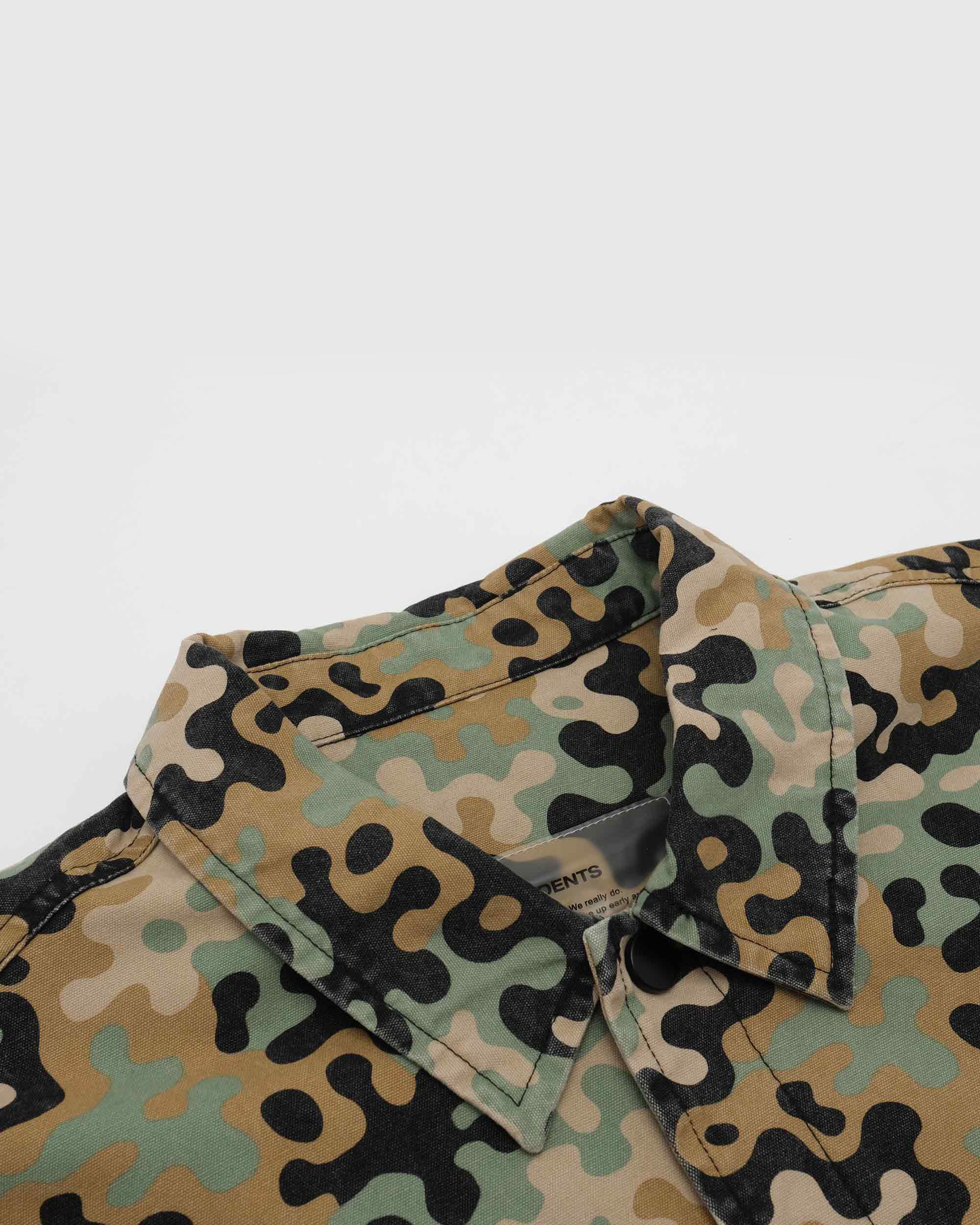 Camouflage-patterned shirt on a white background