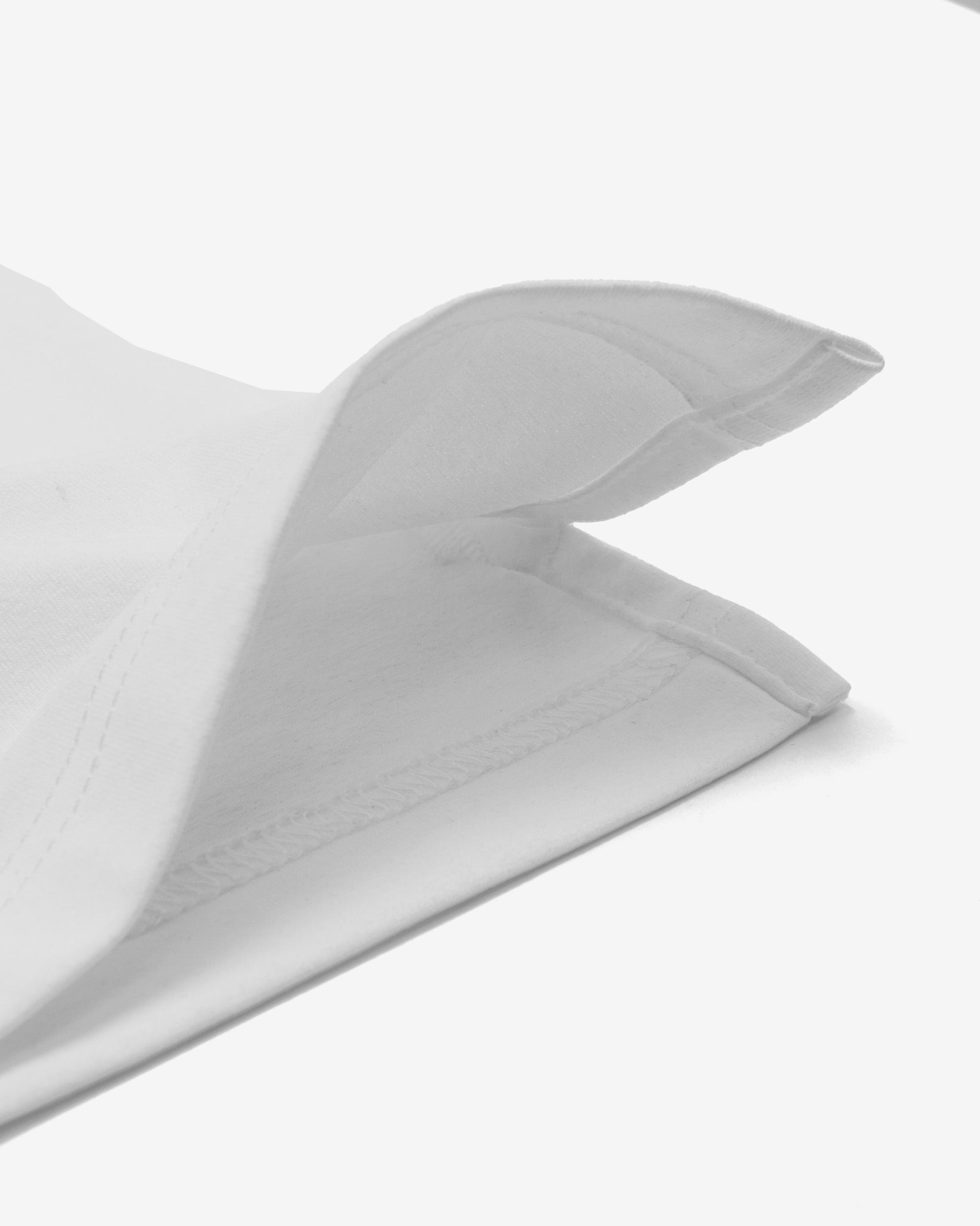 Close-up of a gray pillow on a white background