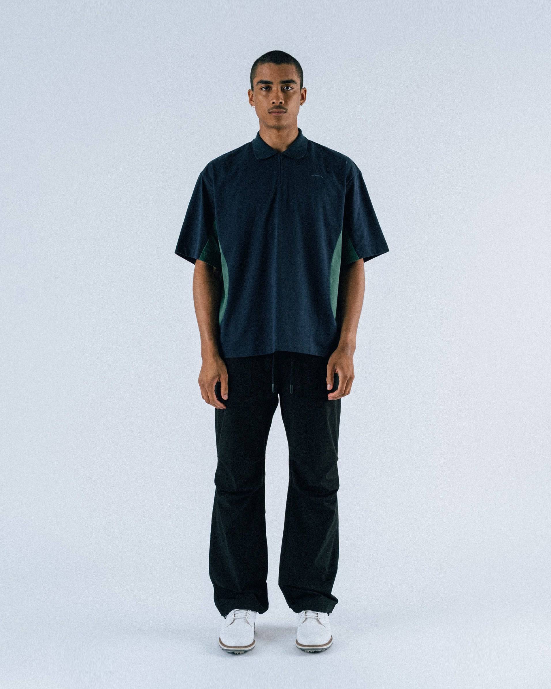 Assistant Jersey Zip Polo Shirt in navy - front view