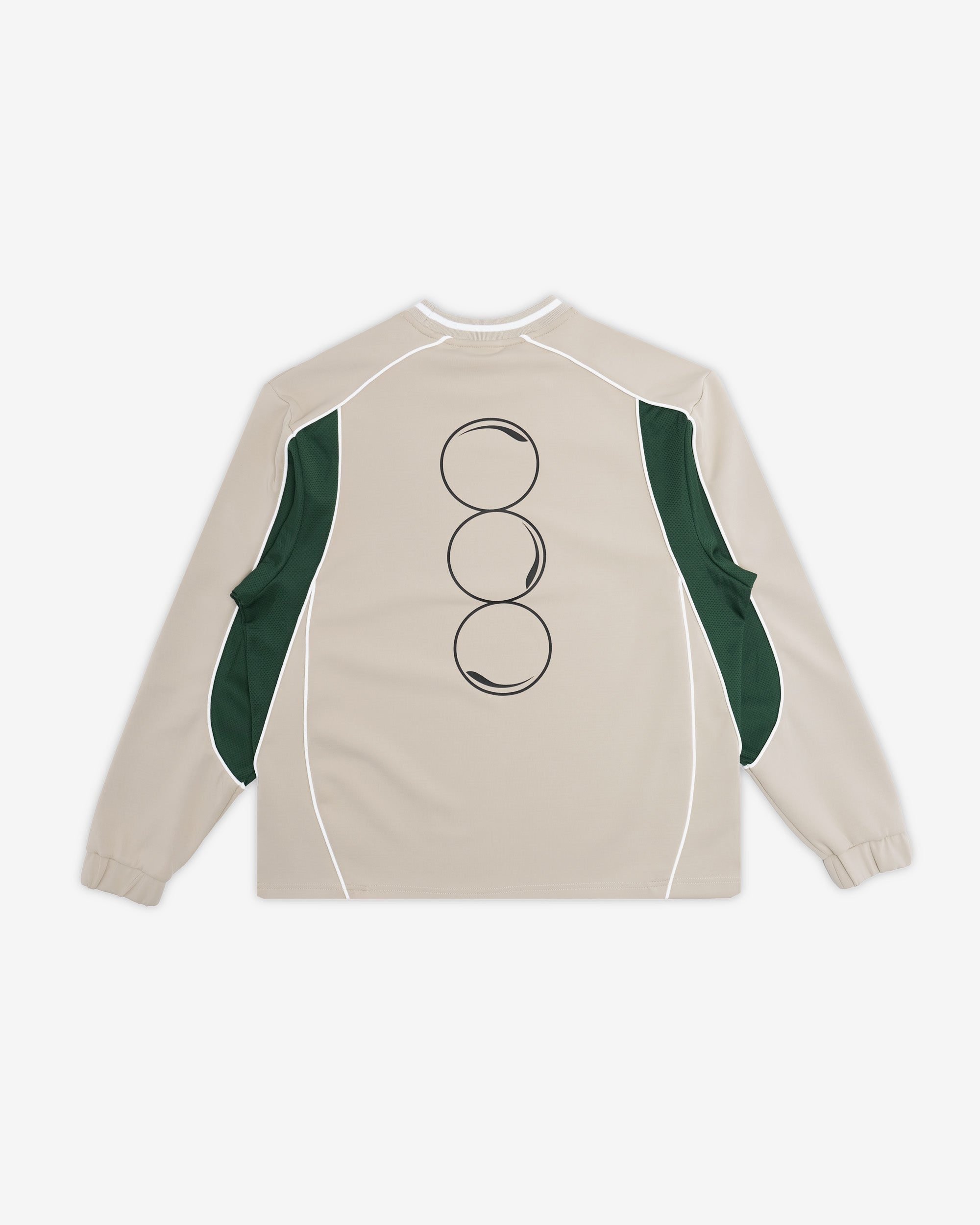 Beige long-sleeve shirt with green accents and abstract design on a white background
