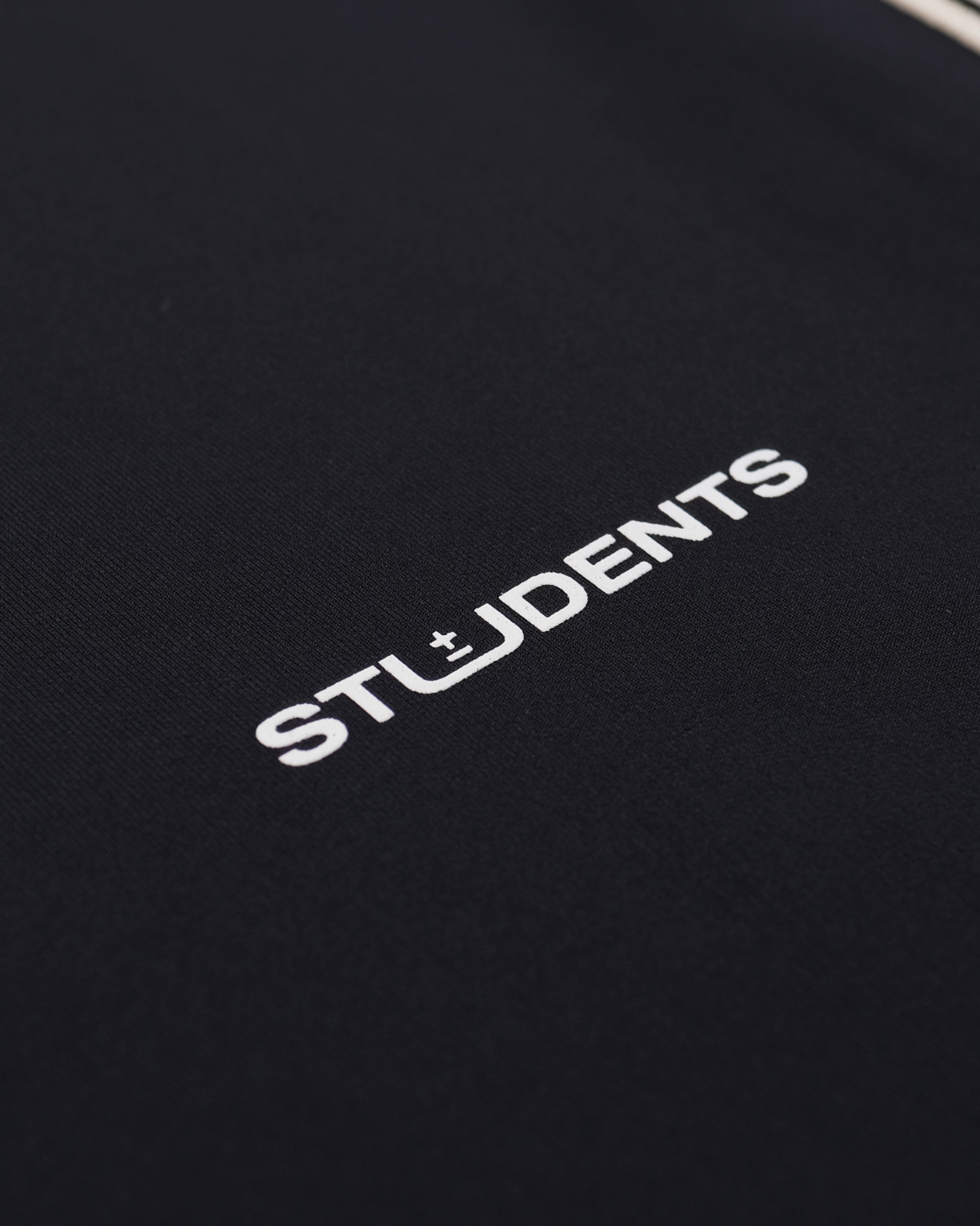 Black bag with 'STUDENTS' text in white on a black background
